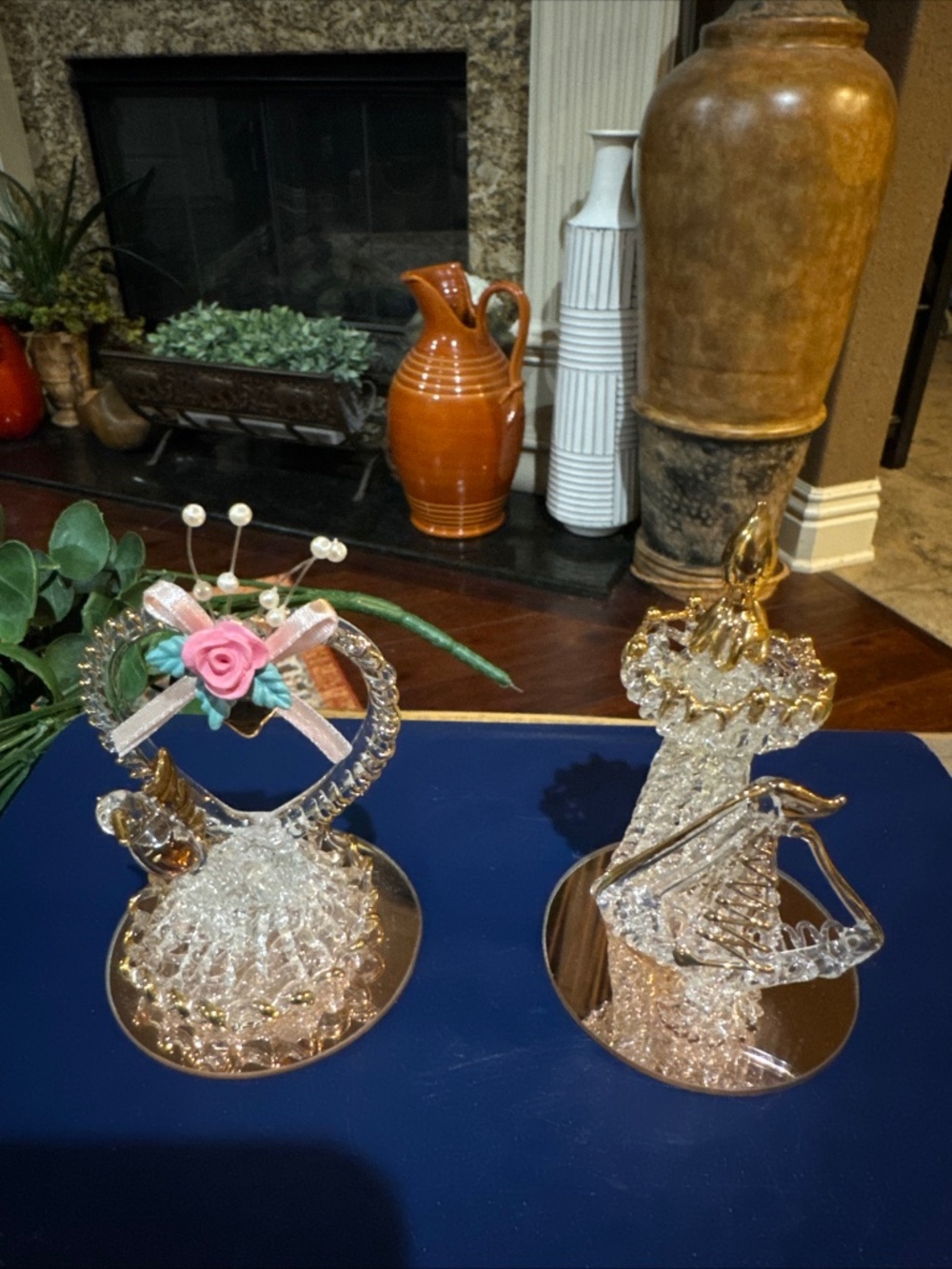 Two 3.25 inch spun glass figurines w/mirrored base.